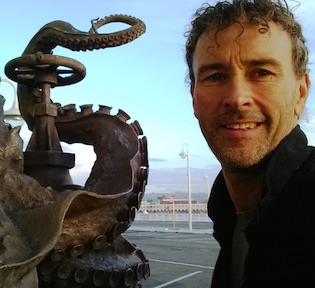 Sean M. Monaghan, MFA - Artist, Foundry owner, Art Instructor, Santa Cruz, CA USA, shown next to his 'Pearl Diver' fountain sculpture, 2016
